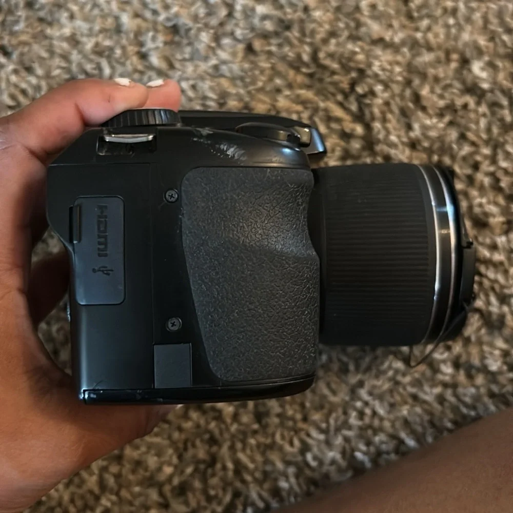 CAMERA Brand:Fuji-film color: Black and it’s digital.